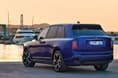 rolls royce cullinan black badge rear three quarter rolls royce cullinan black badge in field